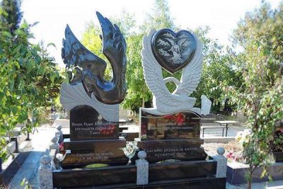 Памятник с голубем, лебедем на могилу